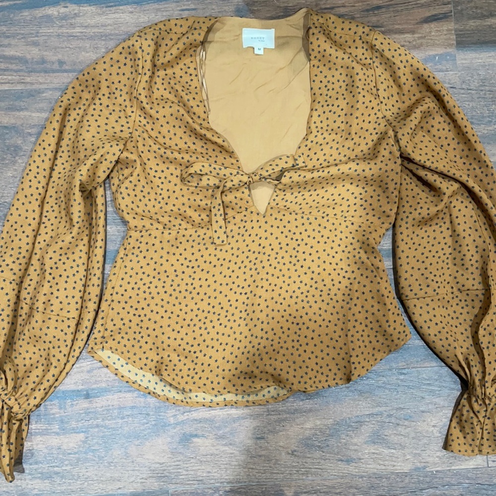 Long sleeve blouse with tie in front & zipper on left side